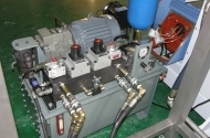 hydraulic unit for flaking mill